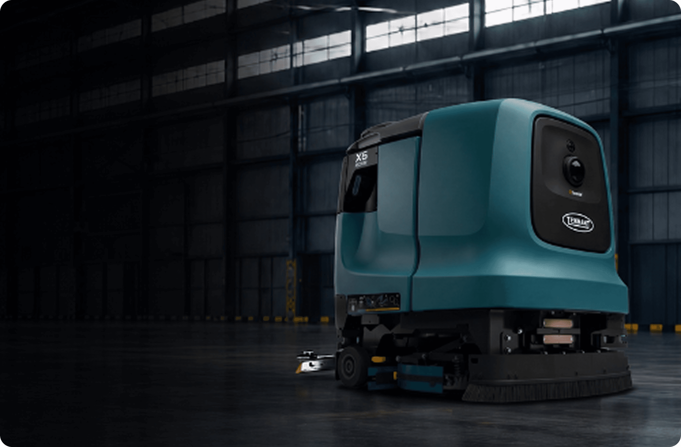 Lavadora robótica Tennant X6 ROVR en un depósito industrial